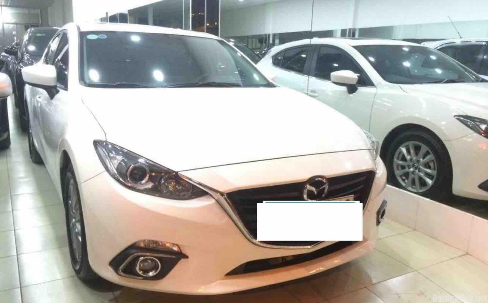 Cần bán xe Mazda 3 Hatchback đời 2015 màu trắng giá 700 triệu - Danhgiaxe